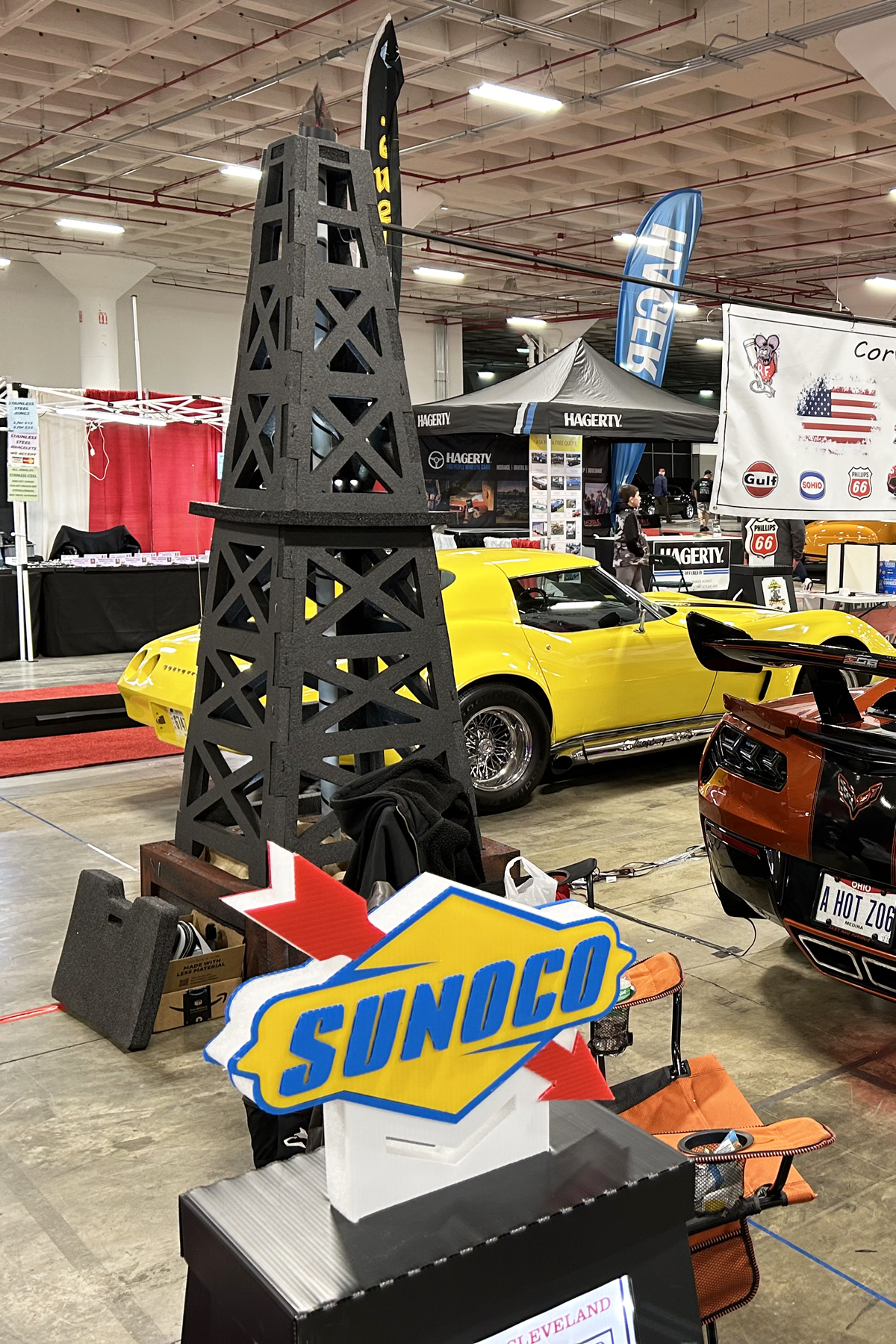 Foam oil rig display at a trade show with Sunoco branding.